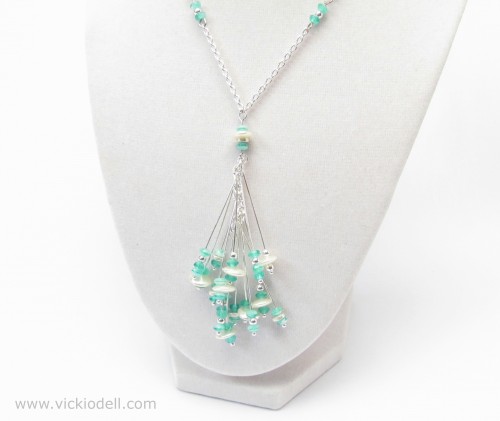 Necklace with gemstones, teal, cream, silver