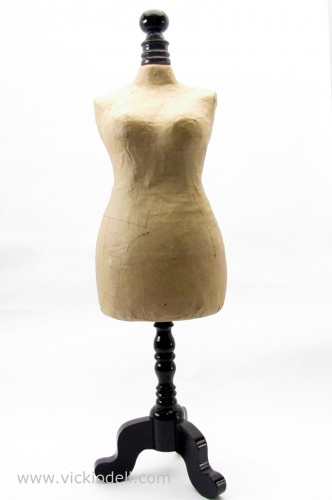 paper mache dress form on a stand